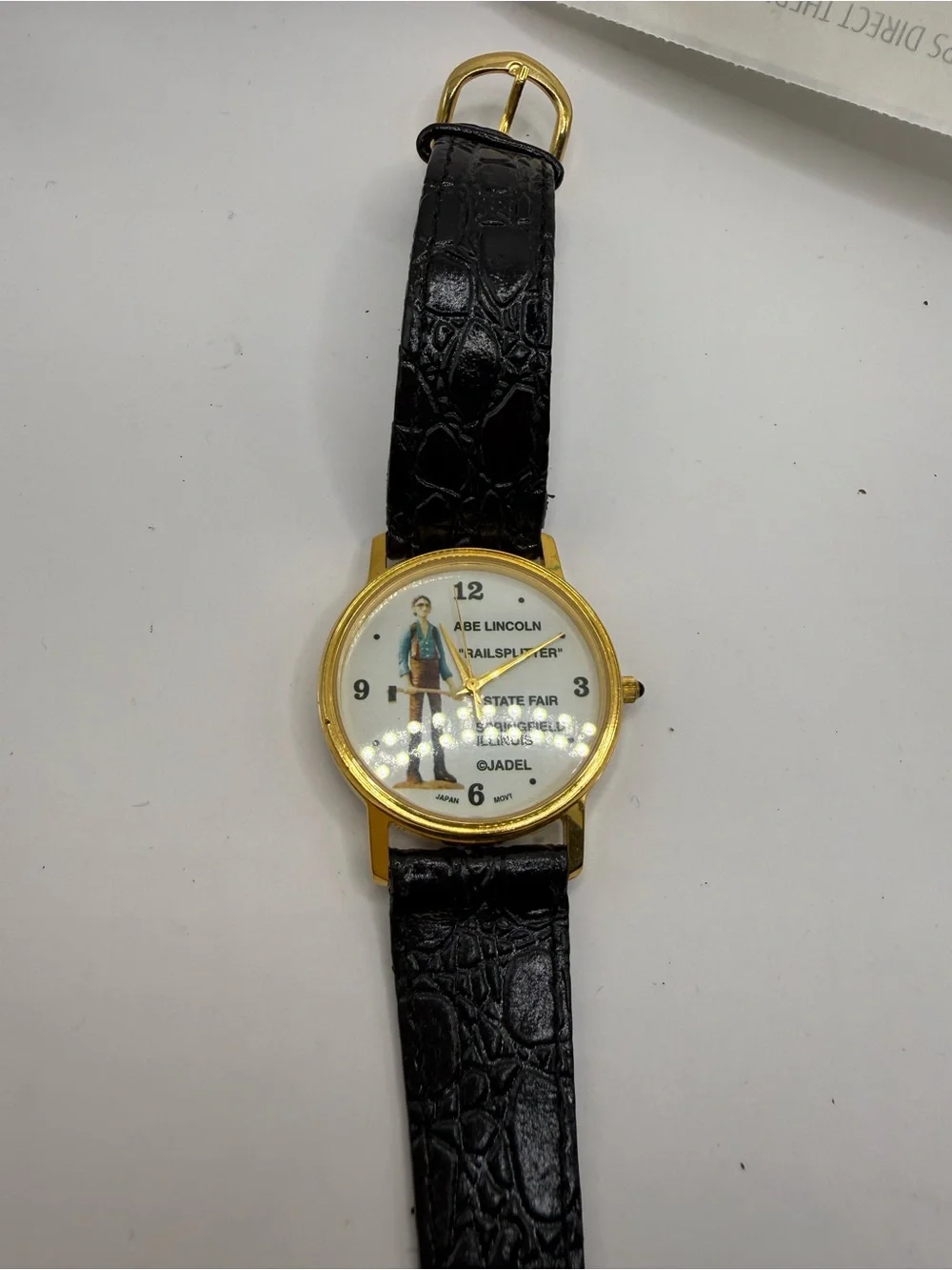 Unknown Brand Black and Gold Analog Watch with Black Strap Abe Lincoln